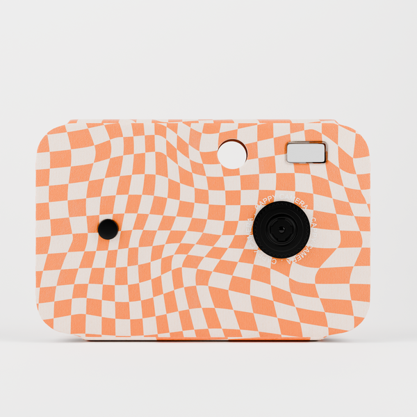 Person holding a personalized camera, capturing a genuine moment with friends